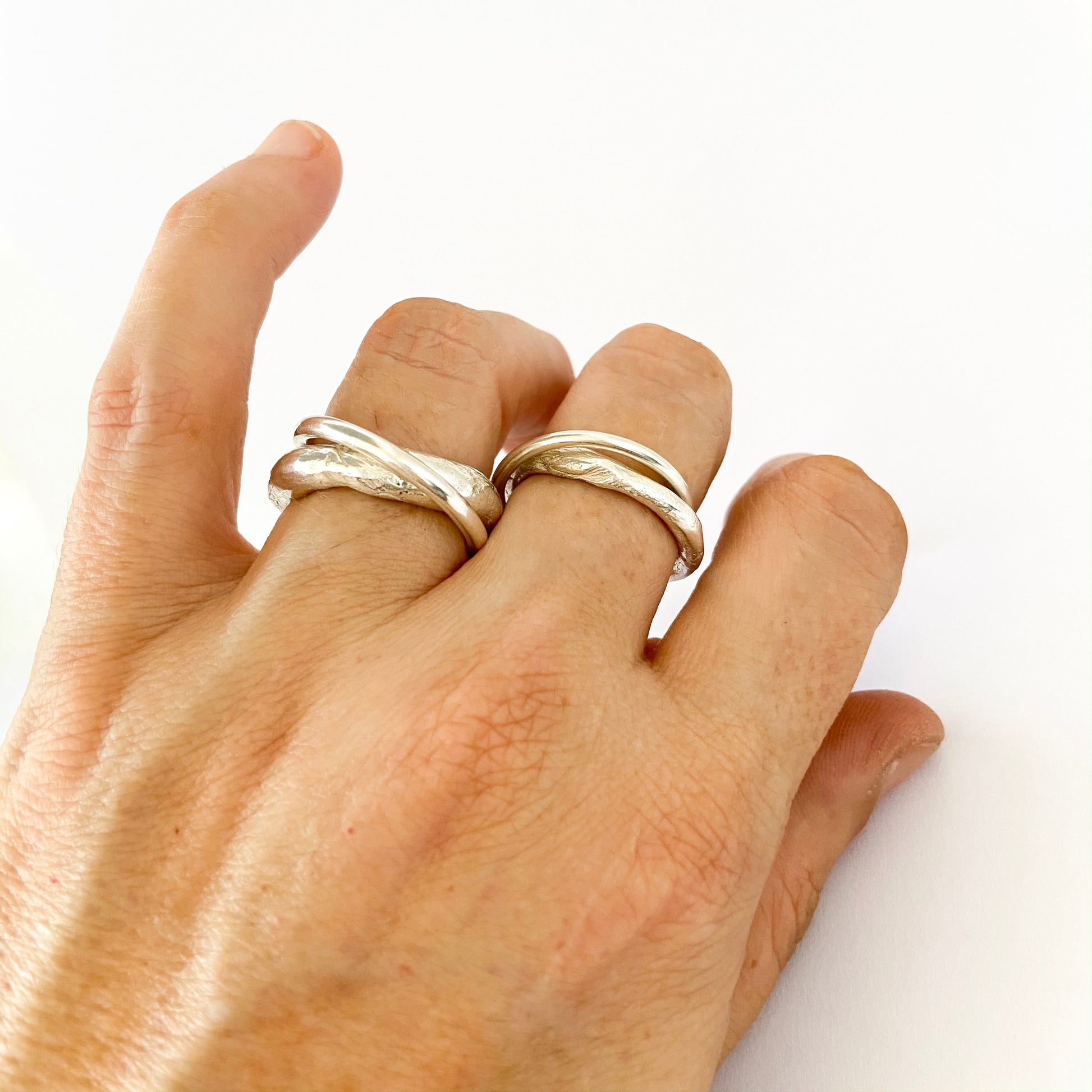 Minimalist wedding/unity rings have an organic feel - by designer Savage Jewellery