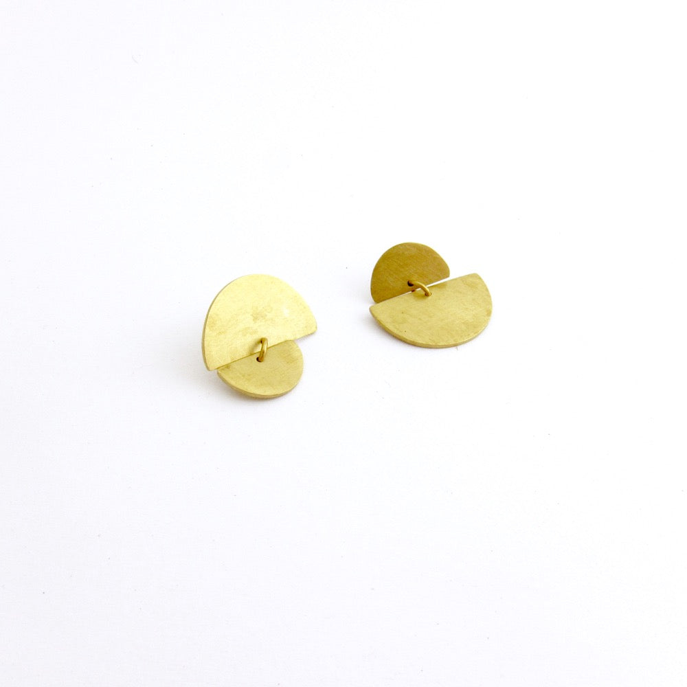 sunrise sunset asymmetrical brass studs by Savage Jewellery